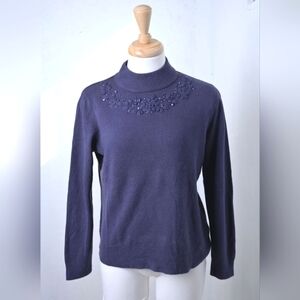 Tradition | Navy blue low turtleneck sweater with embroidered flower & g…